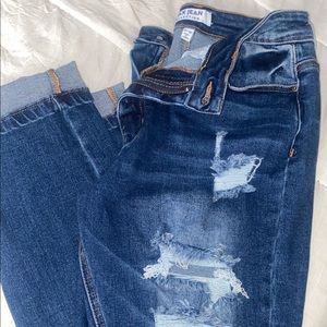 Boyfriend fit ripped jeans with stretch.